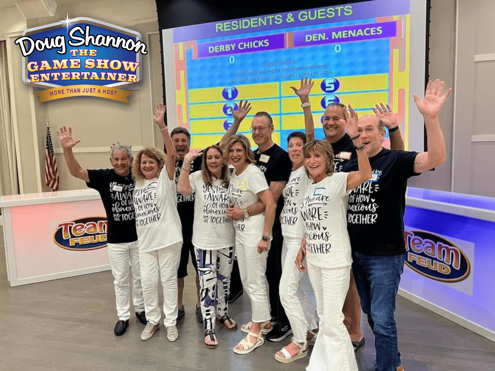 Team Feud with Doug Shannon. Image shows two teams in center with hands raised waving at the audience